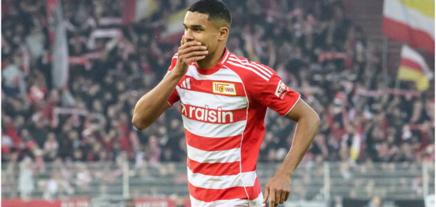 الصورة المميزة لـ: بايرن ميونخ يسقط النقاط أخيرًا: يونيون برلين ينهي سلسلة انتصارات مذهلة عند 16 مباراة!