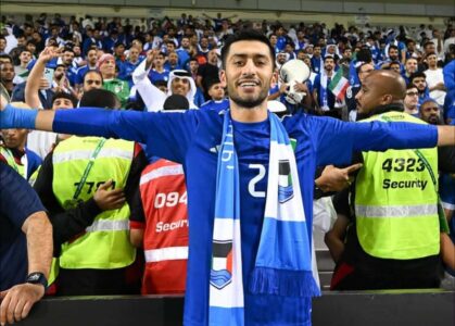 شعار الفيفا والنادي العربي الكويتي مع صورة توضيحية لقضية قانونية